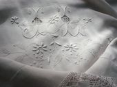 Monogrammed JL embroidered sheet