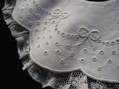 embroidered baby's bib from France