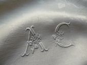 white linen table linens napkins embroidered AC