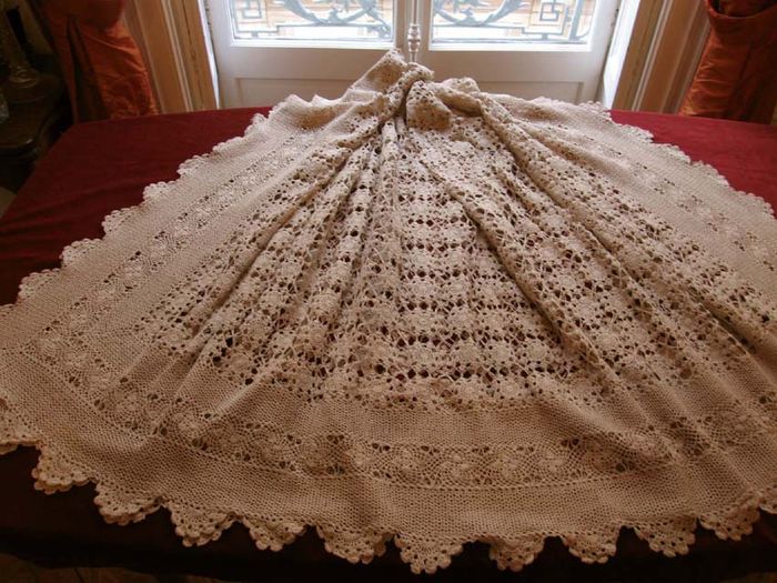 Lightweight and lacy crocheted bed cover